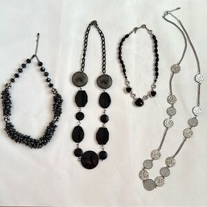Black and silvered fashion jewelry lot of Four